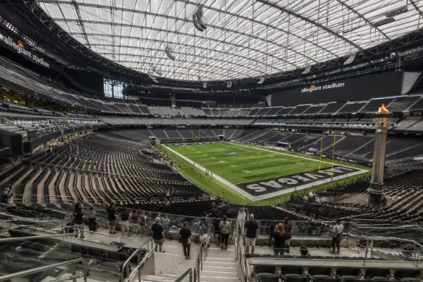 The field and tiered seating sit beneath the translucent roof inside Allegiant Stadium in Las Vegas.