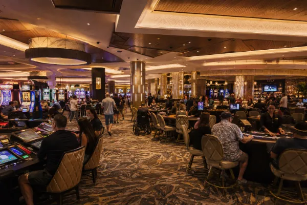 Adult guests play slots and table games inside the smoke-free casino at Park MGM in Las Vegas.