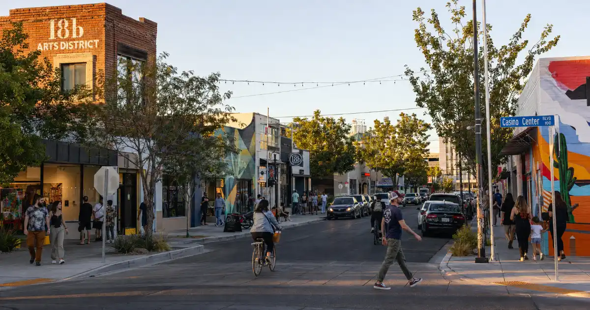 Galleries, murals, shops, restaurants, and pedestrians line a street in the 18b Las Vegas Arts District in Downtown Las Vegas.