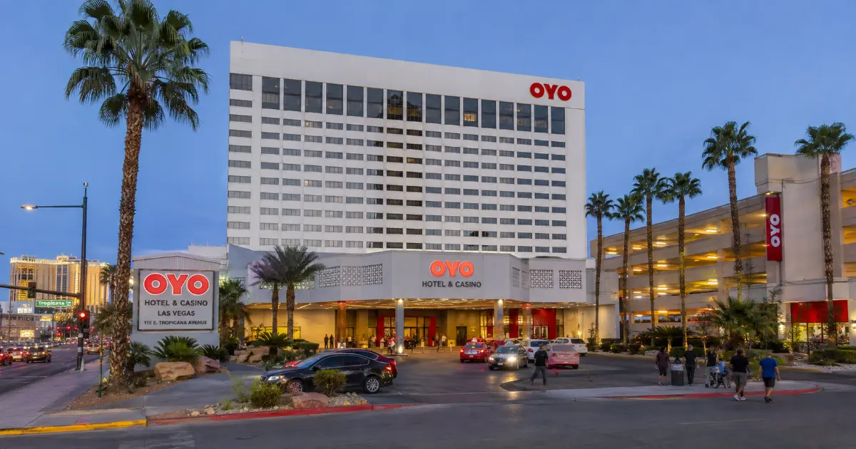 The OYO Hotel & Casino Las Vegas tower and main entrance along East Tropicana Avenue near the south end of the Strip.