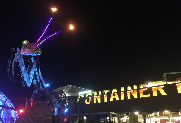 Fire balls are coming off the antennae of the Mantis at Container Park
