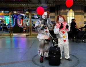 Some very suspicious clowns are busking people on Fremont Street
