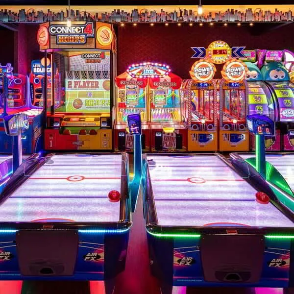 This is a picture of the air hockey tables at The Big Apple video game arcade
