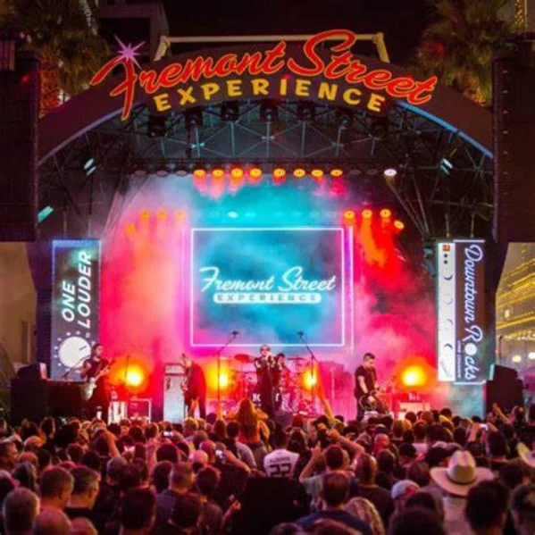 This is a picture of a band playing at a Fremont Street free concert on the main stage in Las Vegas