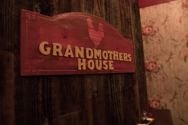 This is a picture of a sign on a door that says Grandmothers House at the Red Riding Hood Escape Game in Las Vegas