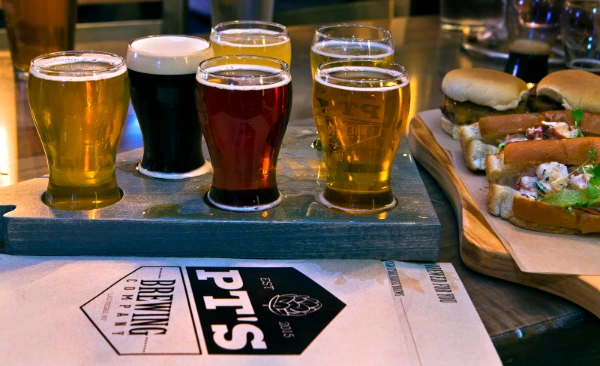 This picture is of a flight of beer glasses at a PTs Pub in Las Vegas