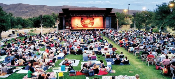 This is an image of people sitting outside at the Super Summer Theatre in Las Vegas