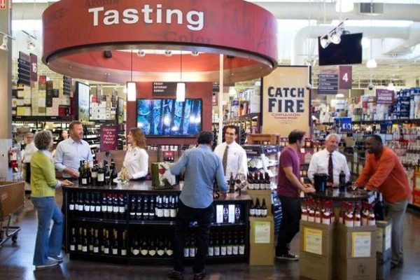 This is a picture of people tasting wine at Total Wine and More in Las Vegas