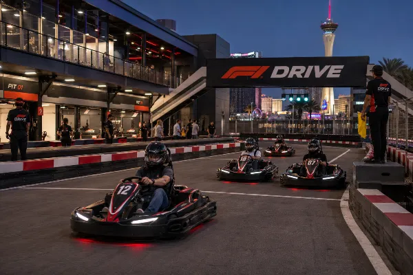 Guests race F1-inspired karts on the controlled F1 DRIVE course at Grand Prix Plaza.