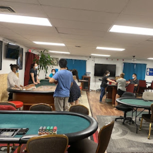 Student practice table games dealing at the Royal Dealer School in Las Vegas