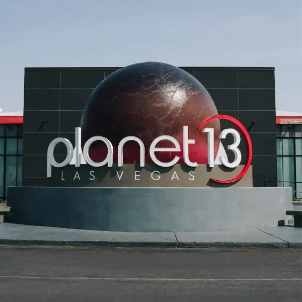 Planet 13 Las Vegas exterior sign with spherical planet design and bold red 13 logo