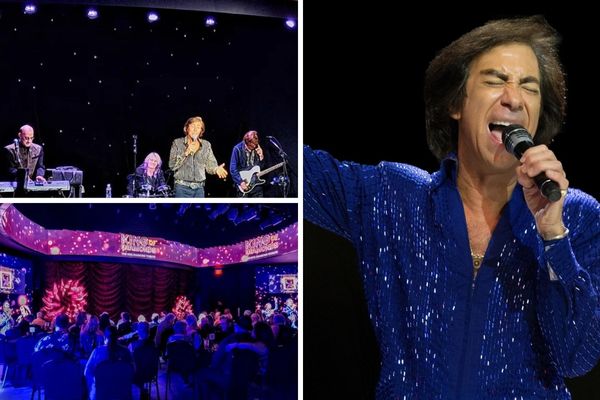 A promotional image for the King of Diamonds Neil Diamond tribute show, showing the performer Rob Garrett in a white suit with a guitar on a stage with a live band.