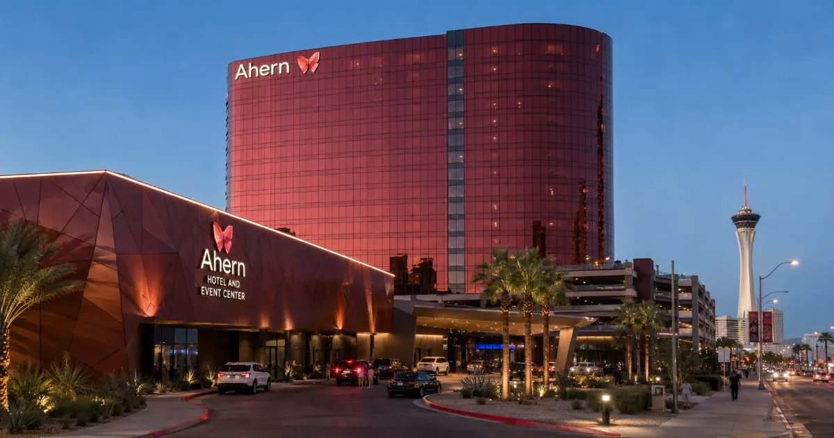 The red-glass Ahern Hotel and event center stand near the north end of the Las Vegas Strip on West Sahara Avenue.