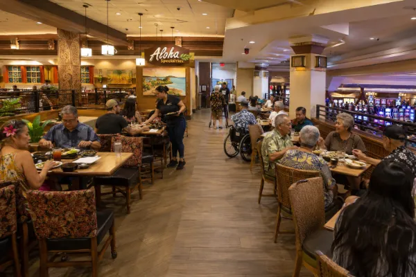 Guests enjoy island-inspired meals in a Hawaiian-themed dining area at California Hotel & Casino in downtown Las Vegas.