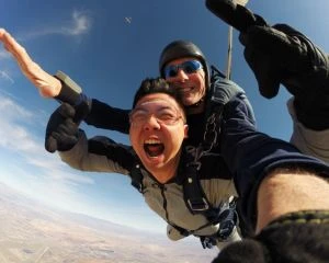 A man takes a skydive in las vegas from 12500 feet in the air at the jean airport