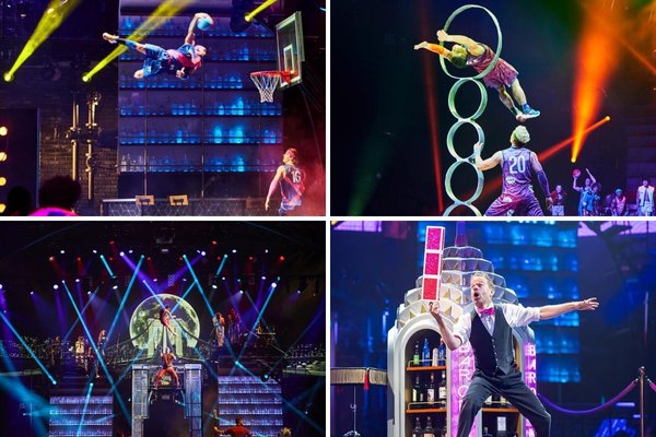 A promotional image for the Mad Apple by Cirque du Soleil show, showing a performer on a stage in a red dress with an apple on her head and a crowd of people behind her.