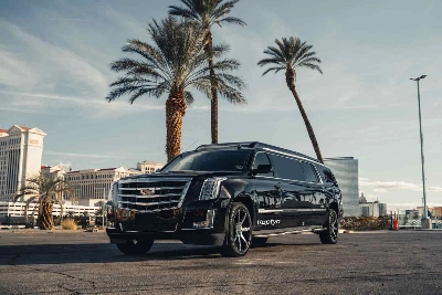 Black Cadillac Escalade limousine parked in Las Vegas for a private airport transfer