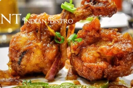 vegan fried chicken with green onions onions and chili slices at indian bistro restaurant in las vegas