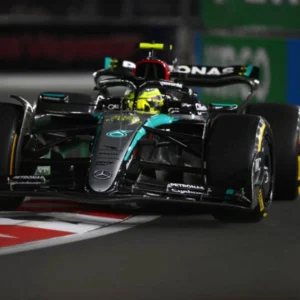 Mercedes AMG Petronas Formula One car during practice session at Las Vegas Grand Prix navigating corner with Pirelli tires and sponsor branding