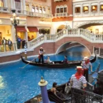 Gondola rides at Venetian Grand Canal Shoppes Las Vegas with gondoliers ornate Venetian architecture and decorative indoor canal