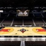 Michelob ULTRA Arena in Las Vegas with Las Vegas Aces basketball court and scoreboard ready for game