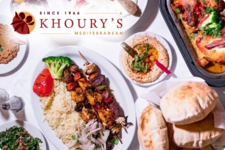 vegan mediterranean food with hummus kebabs rice vegetables and pita bread at khourys restaurant in las vegas