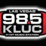 logo for 98.5 kluc las vegas hit music radio station with bold font and red accents
