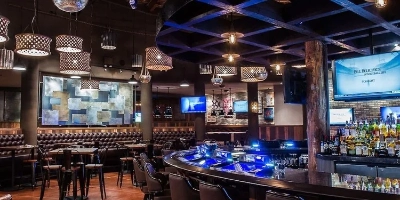 televisions and video poker machines surround the distill sports bar in Las vegas