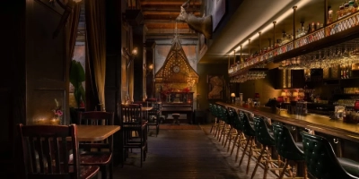 The moody elegant and intimate salon-style interior of Doberman Drawing Room in the Las Vegas Arts District