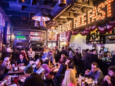 evel pie pizza slice and beer with rock memorabilia