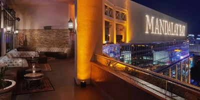 The iconic north facing view of the Las Vegas Strip at night from the outdoor patio of Foundation Room at Mandalay Bay