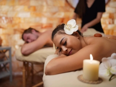 couple enjoying valentines day massage in las vegas spa with candles and peaceful ambiance