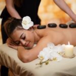 a woman receiving a relaxing therapeutic massage in a Salt Room in las vegas