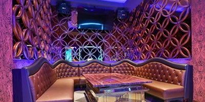 Luxury private karaoke suite at KAMU Ultra Karaoke in Las Vegas with plush seating and lights