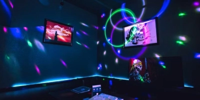 Neon lit private karaoke room at Ninja Karaoke in Las Vegas with themed décor