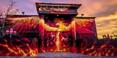 exterior of the phoenix bar and lounge gay bar in las vegas with vibrant phoenix mural and welcoming entrance on sahara avenue