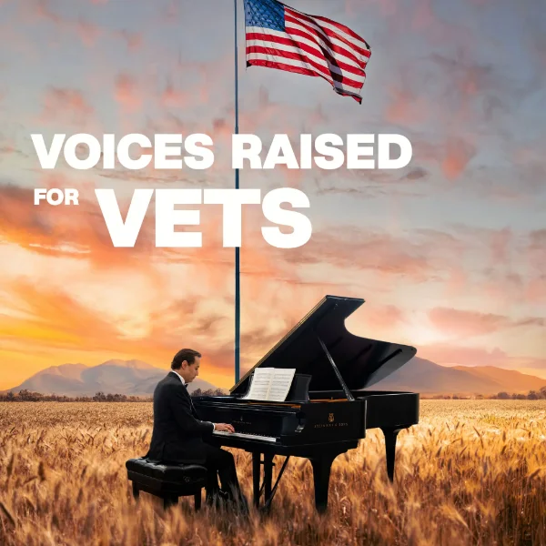 patriotic concert poster for voices raised for vets in las vegas with pianist in wheat field and american flag at sunset