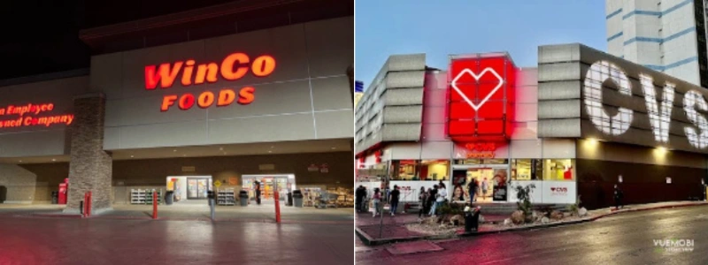 nighttime storefronts of winco foods and cvs pharmacy in las vegas showing retail access and branding
