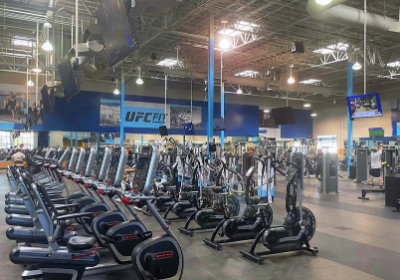 UFC FIT Centennial gym interior showing the cardio floor and training area
