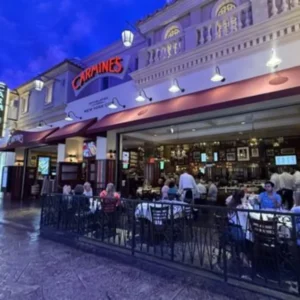 Exterior and open-air dining area of Carmine’s Italian restaurant at Forum Shops Las Vegas