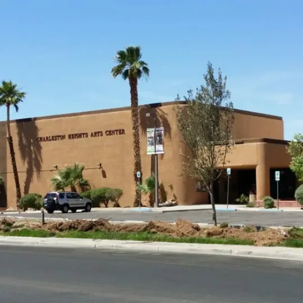 Exterior view of the Charleston Heights Arts Center in Las Vegas featuring the building facade, sign, and entrance.