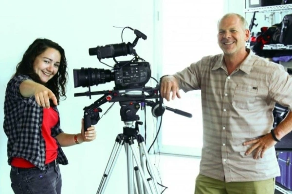 Film Connection student learning on set with a mentor during hands-on film production training