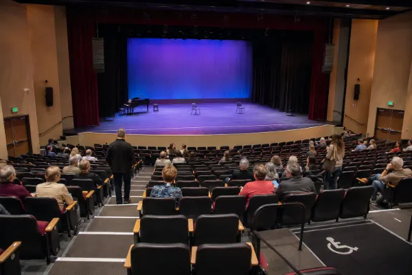 The Jeanne Roberts Theater at Charleston Heights Arts Center features a stage, fixed seating, and clear audience aisles.
