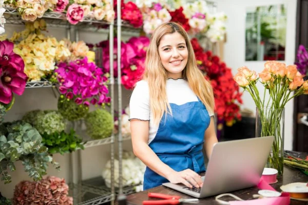 Student working at a floral design workstation during hands-on training in Las Vegas