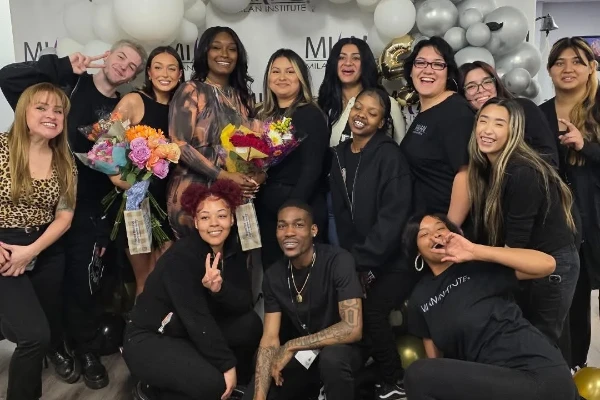 Milan Institute students celebrating graduation from beauty and massage therapy programs in Las Vegas