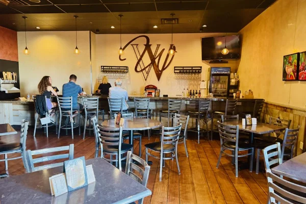Interior of Vegas Valley Winery tasting room in Henderson, Nevada featuring cozy seating, wine bar, and modern decor