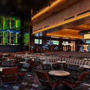 Modern sportsbook lounge at The Tavern during March Mania at Fontainebleau Las Vegas with large screens and comfortable seating