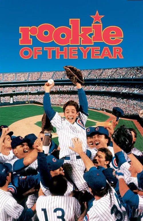 90s comedy movie poster for Rookie of the Year showing a young boy in a Chicago Cubs baseball uniform being hoisted in celebration by teammates inside a crowded stadium.
