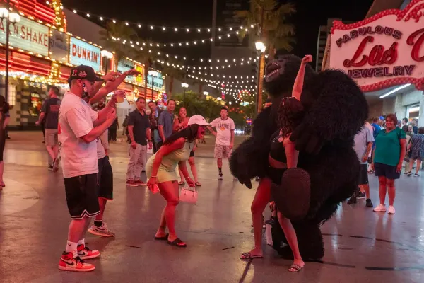 Gorilla-costumed busker entertaining visitors at the Fremont Street Experience in downtown Las Vegas