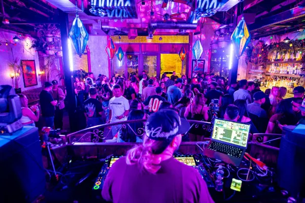 La Mona Rosa Las Vegas restaurant and nightclub with bar lights DJ booth and Fremont East nightlife energy